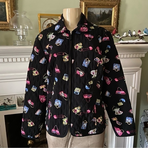 Quilted jacket by requirements with purses galore all over on a field of black. - Picture 1 of 5